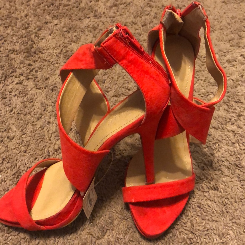 Strappy red heels